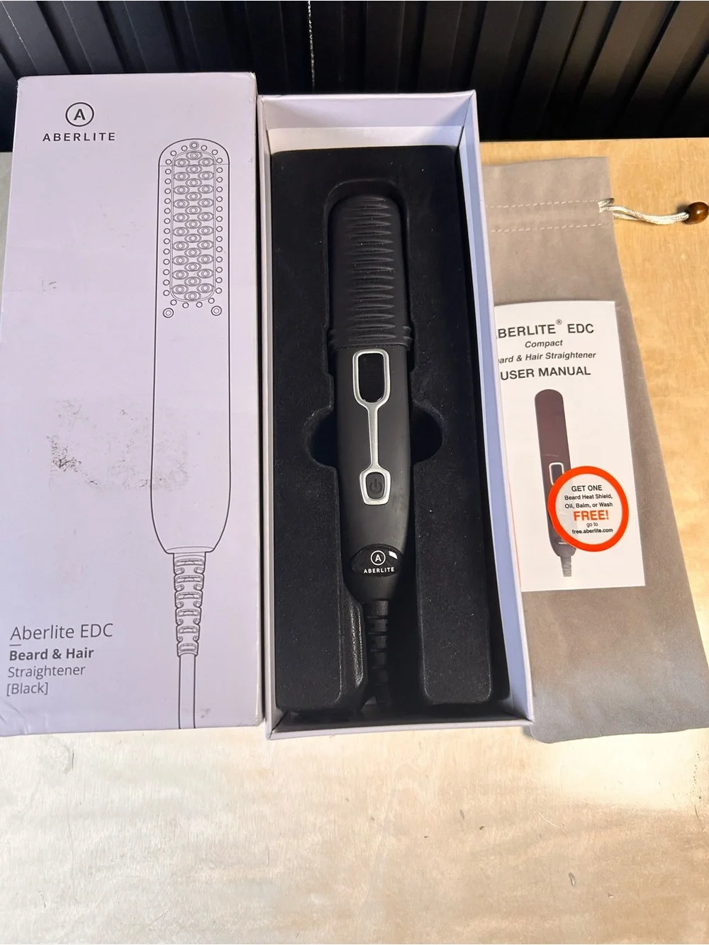 Aberlite edc beard and hair straightener.  Used once